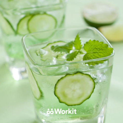 iced drink with cucumber and mint garnish