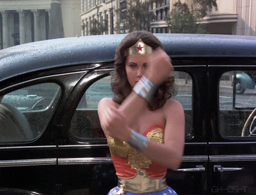 Wonder Woman deflects bullets with her bracelets