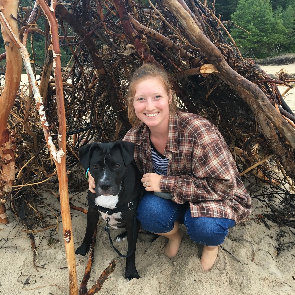  Brooke Houser with dog on a beach