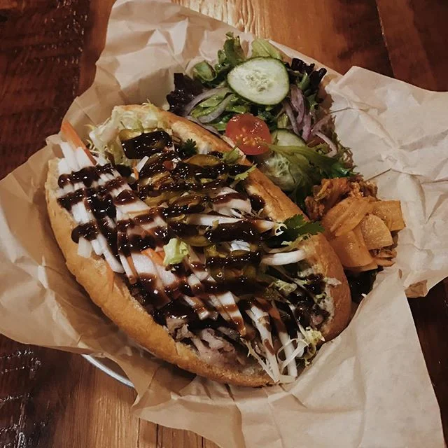 Make dinner plans yet? Swing by and checkout our newest menu addition, the Bahn-Mi Brisket Sandwich.