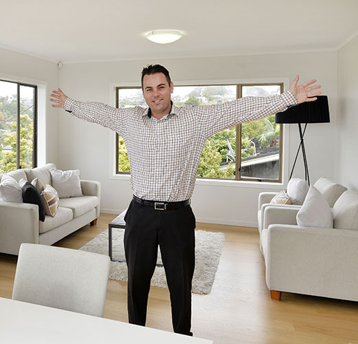 drew miller real estate arms out.jpg