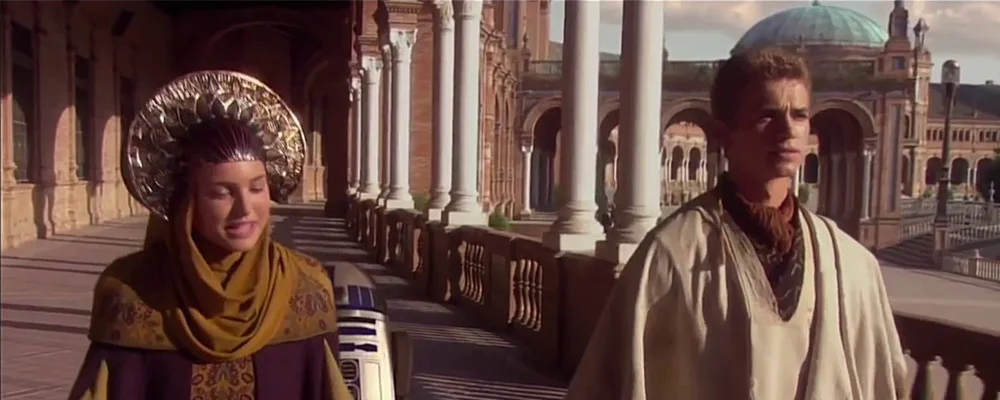 Anakin and Padme travel incognito, while dressed like flamboyant robotic peacocks