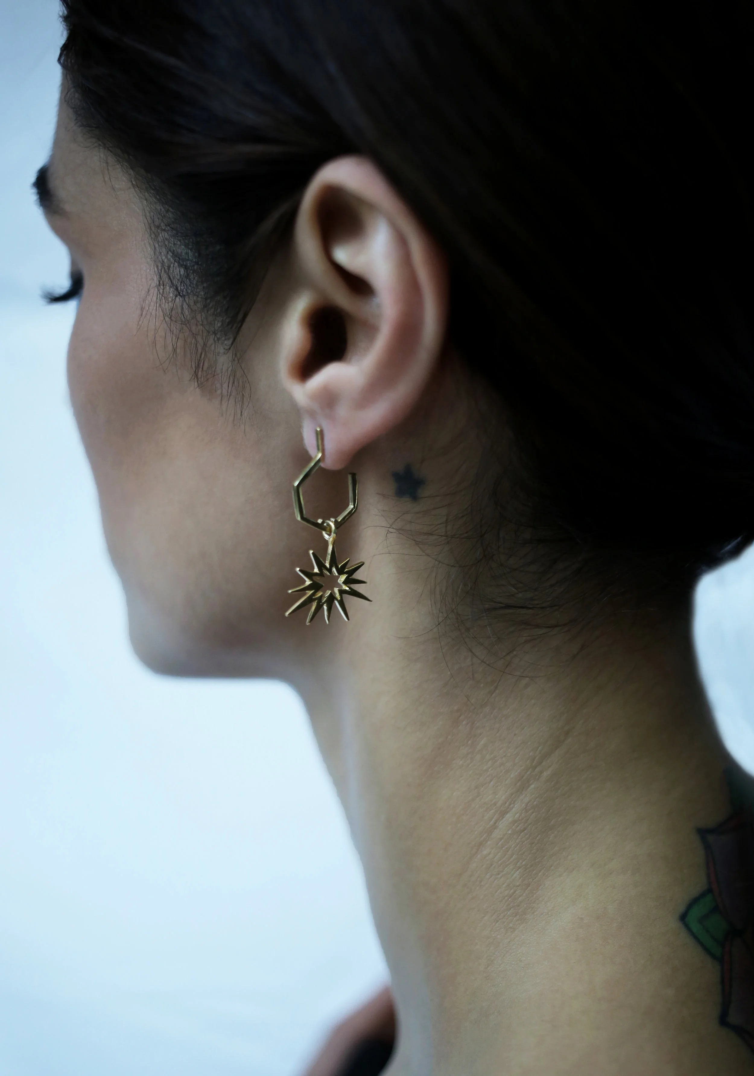 The 'BADABOOM' earrings • gold 
