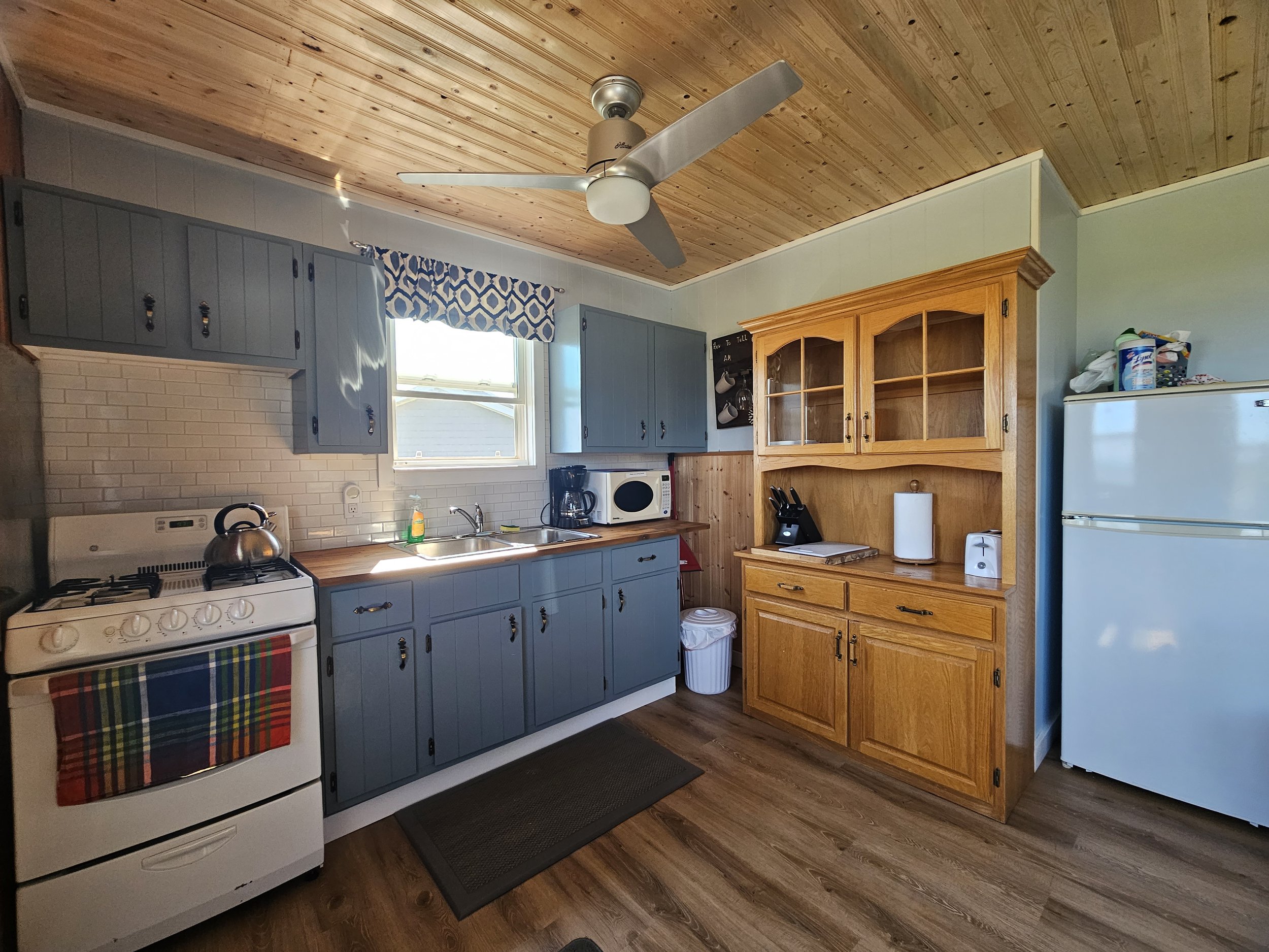 Kitchen-Cottage - propane stove, new bamboo countertops in 2020.jpg