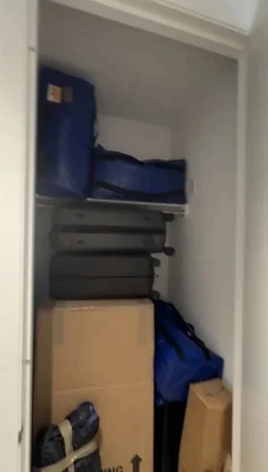 moving before coat closet organization shelfie nyc.jpg