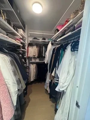 after primary closet custom elfa color coded shelfie nyc.jpg