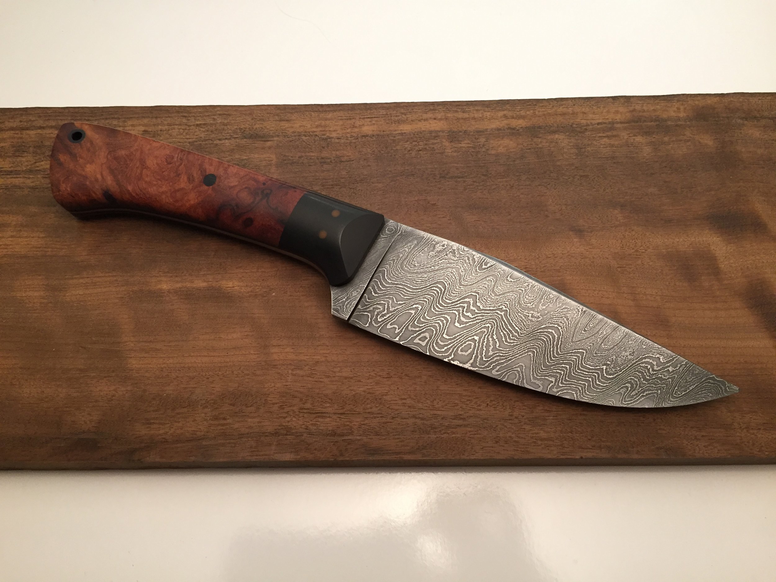 Ironwood handle, black micarta bolster