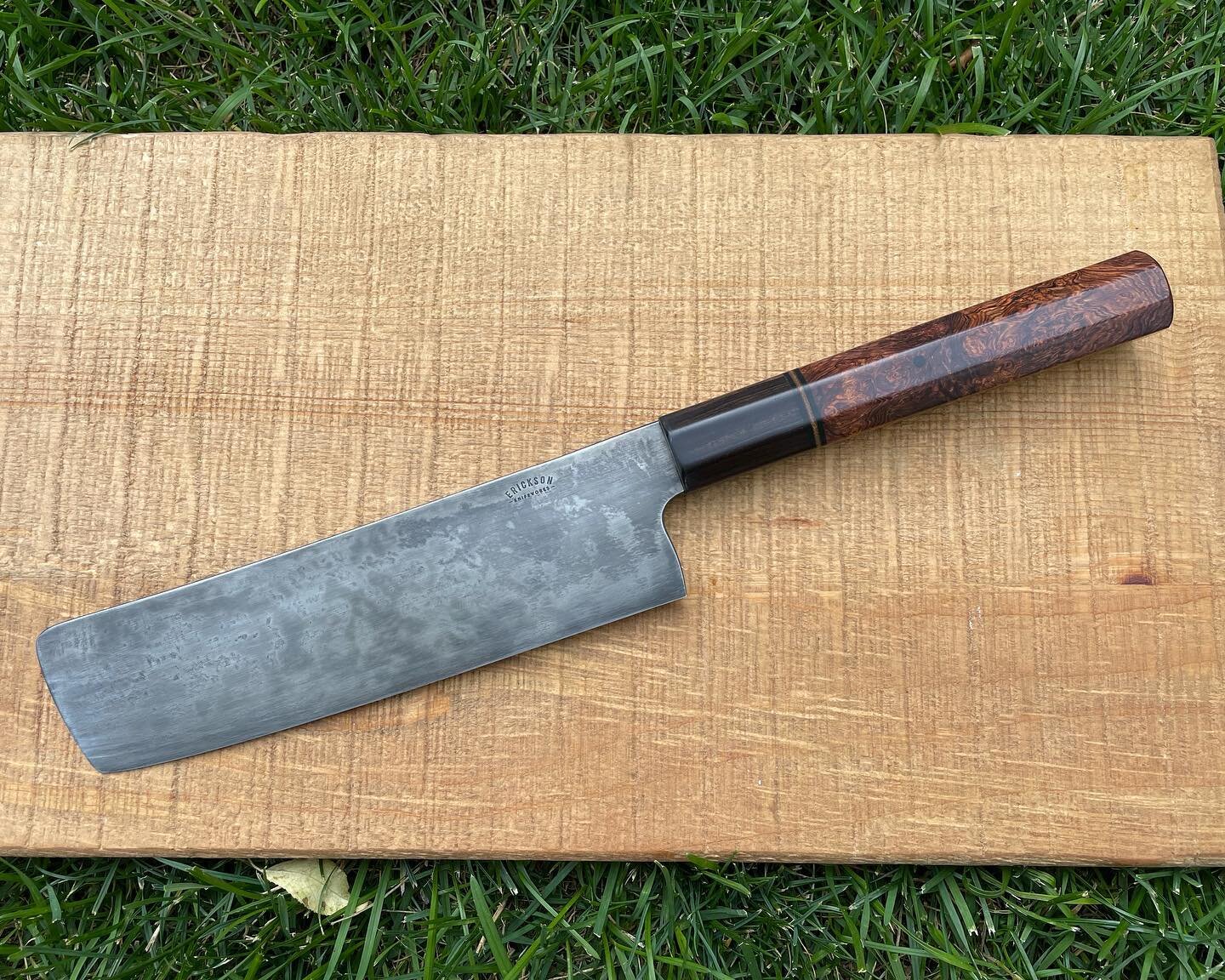 I finished this Nakiri a little while ago and forgot to post it. It struck me that every material was from a different continent. Hitachi Blue 2 carbon steel from Asia, Honduran Rosewood Burl from North America and an African Blackwood ferrule. 
.
.
