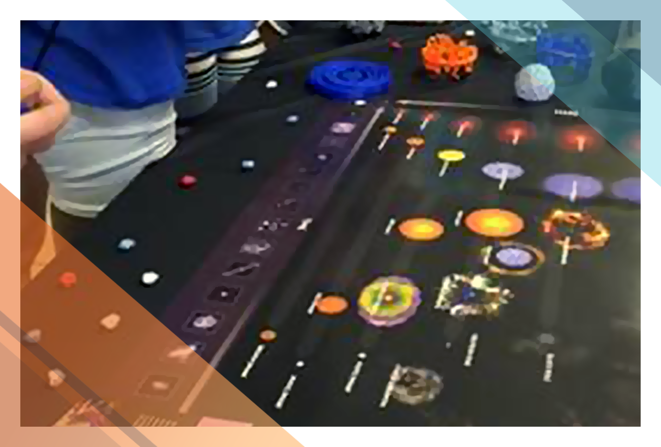 A stellar evolution infographic laid out on a table.