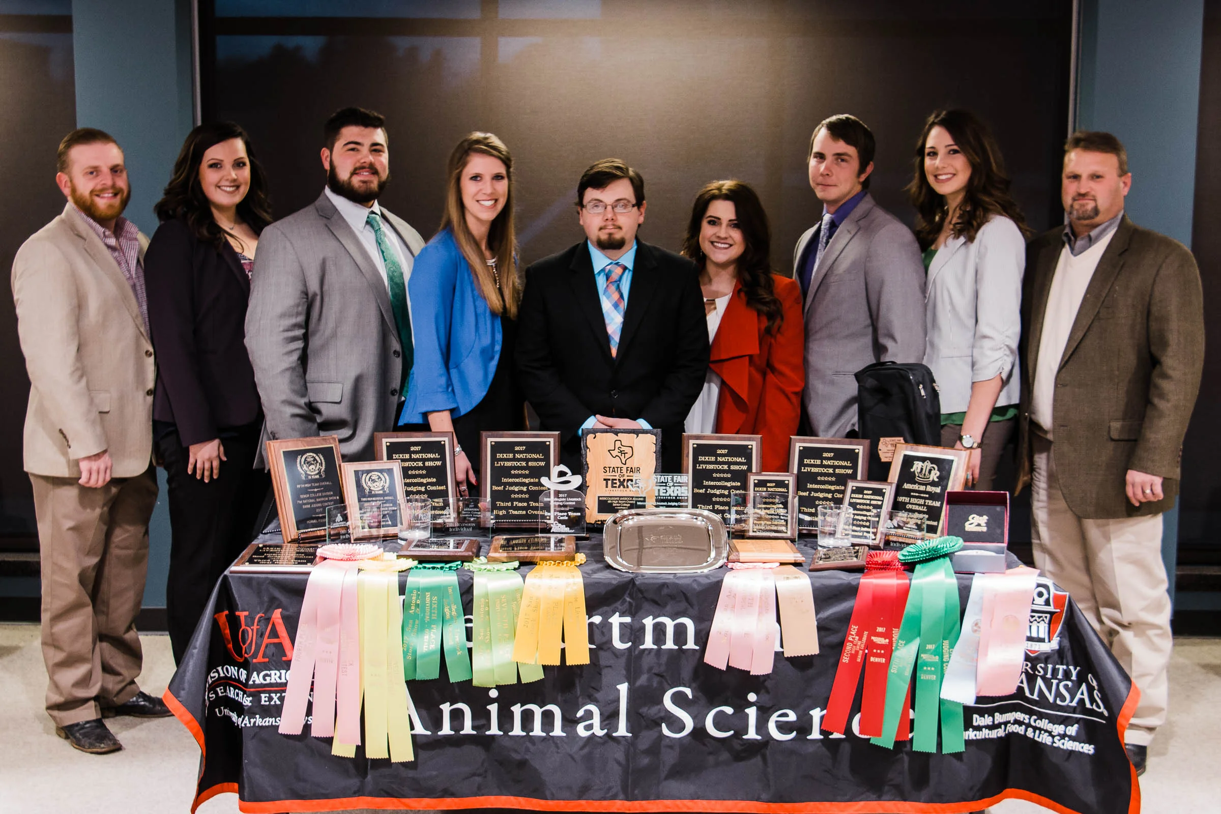 A behind-the-scenes note about this picture of the University of Arkansas Livestock Judging Team. See the guy in the very middle? Sick. As. A. Dog. We kept his fever-ridden self quarantined in a corner until the last possible second, took the pictures, and then got the heck away from him. At last report no one else has caught it.