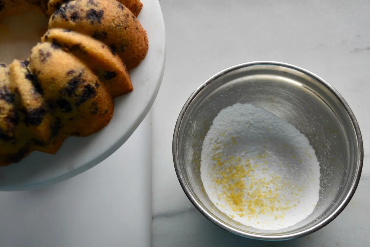 Instead of sifting, I put a strainer over the bowl on a scale and measure confectioners' sugar into it. I use a small whisk to push the sugar through the strainer and eliminate lumps.