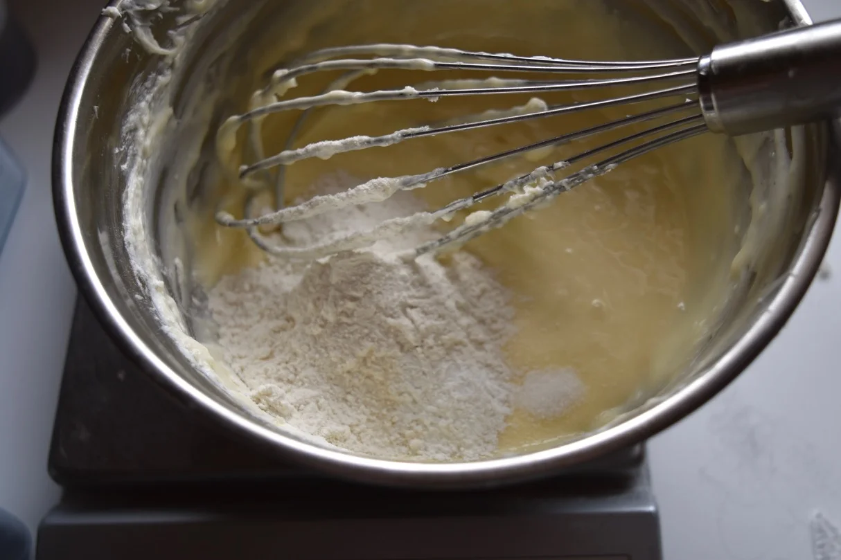The little bit of flour, baking powder, and salt in the cream cheese filling helps it stay on top of the batter during baking.