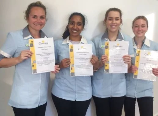 PROUD STAFF MEMBERS AND DR DINUSHA THALAGLA WITH THEIR CERTIFICATES