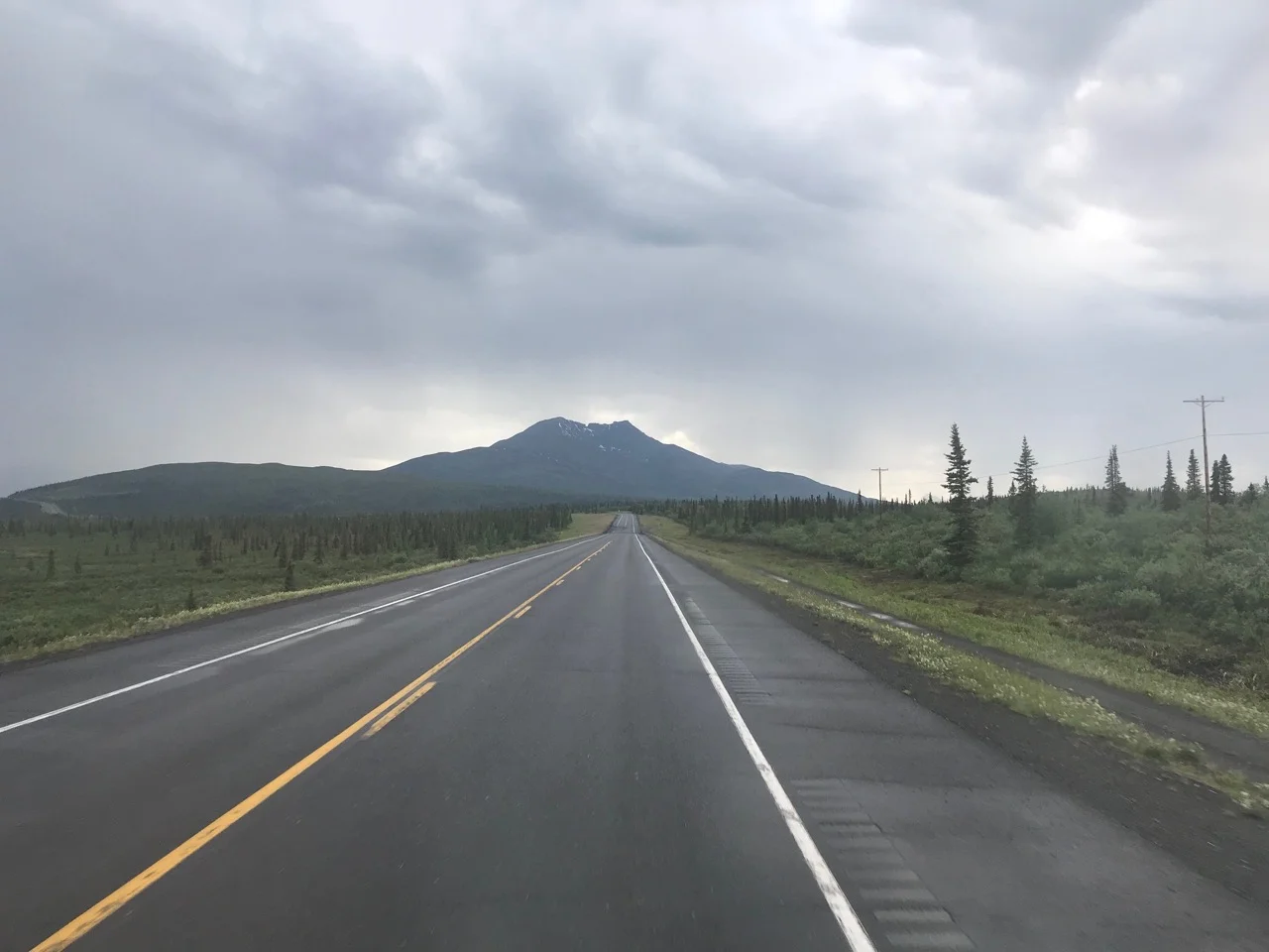 Headed west on the Glenn Highway, with Gunsight Mountain in the distance.