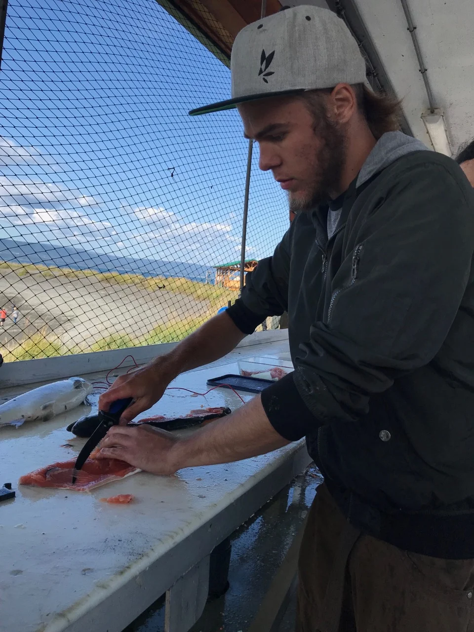 Cleaning the freshly caught salmon. This was my first time filleting a salmon, turns out it was pretty easy