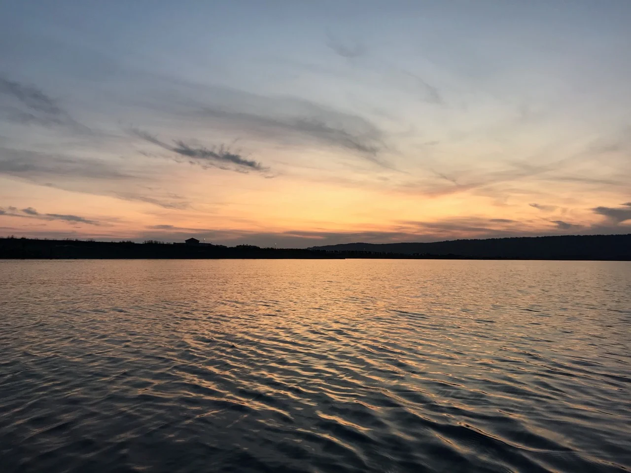 The sunset over Kachemak Bay from Connor’s kayak. (Yes the water was calm enough to take a tiny unstable kayak on there lol).