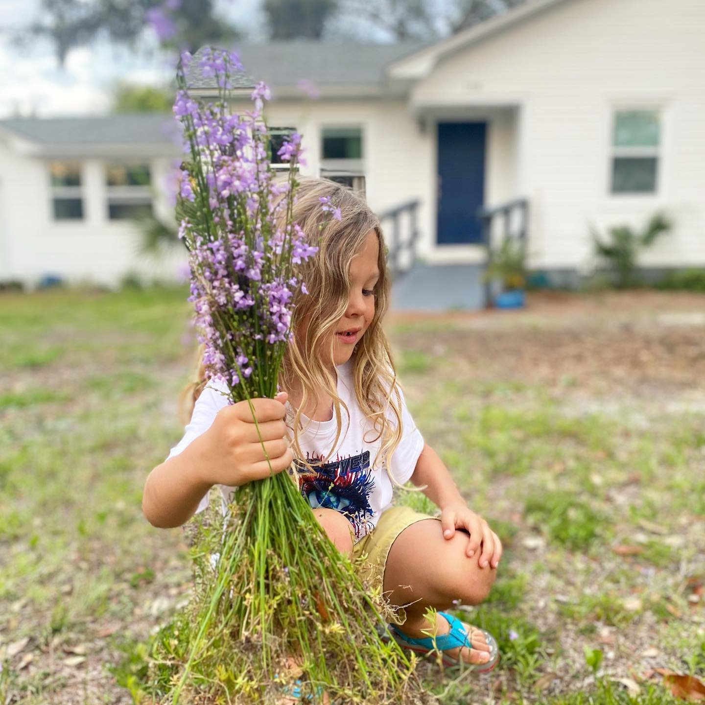 Springtime with Izzy 🌱💜🥰 He&rsquo;s growing as fast as the weeds. Can someone please slow down time?!
