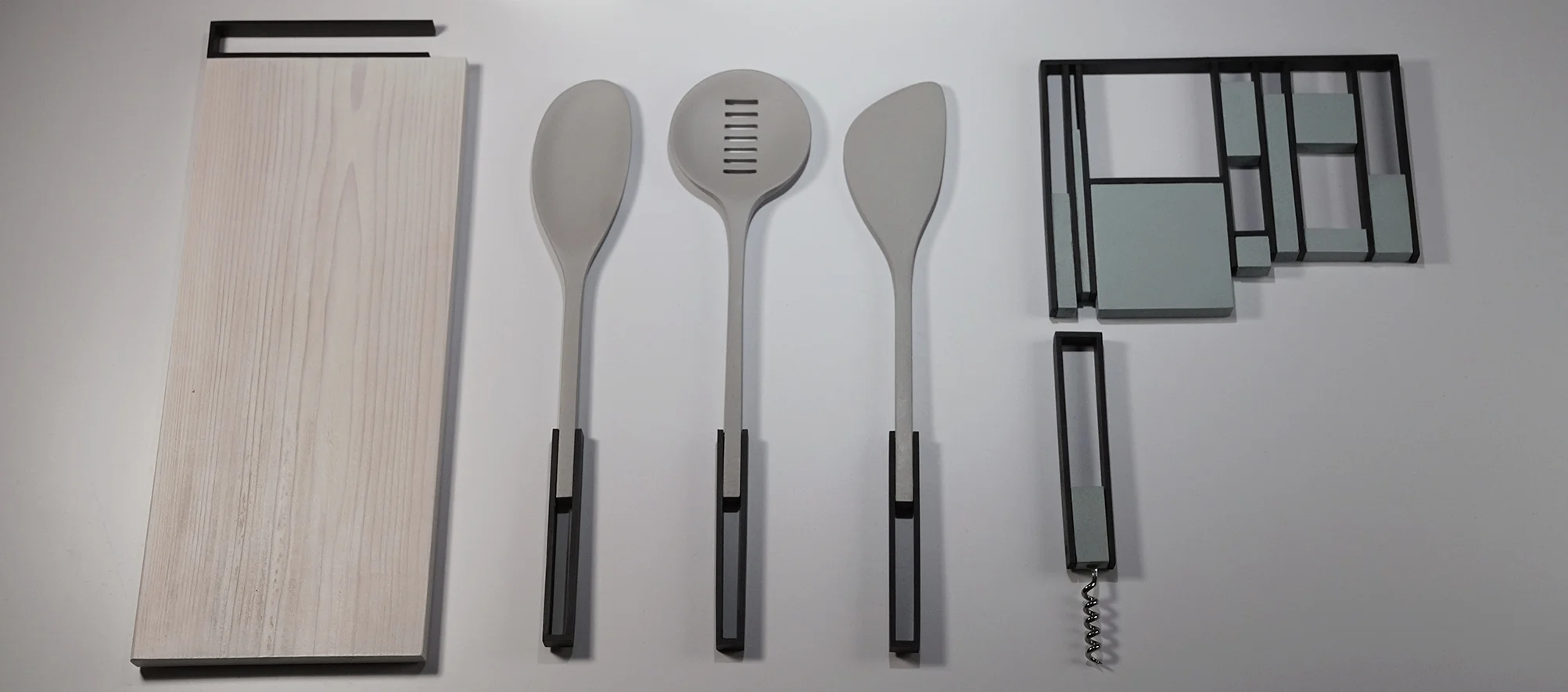The collection features metal frame handles that allow for it to be displayed in the kitchen.