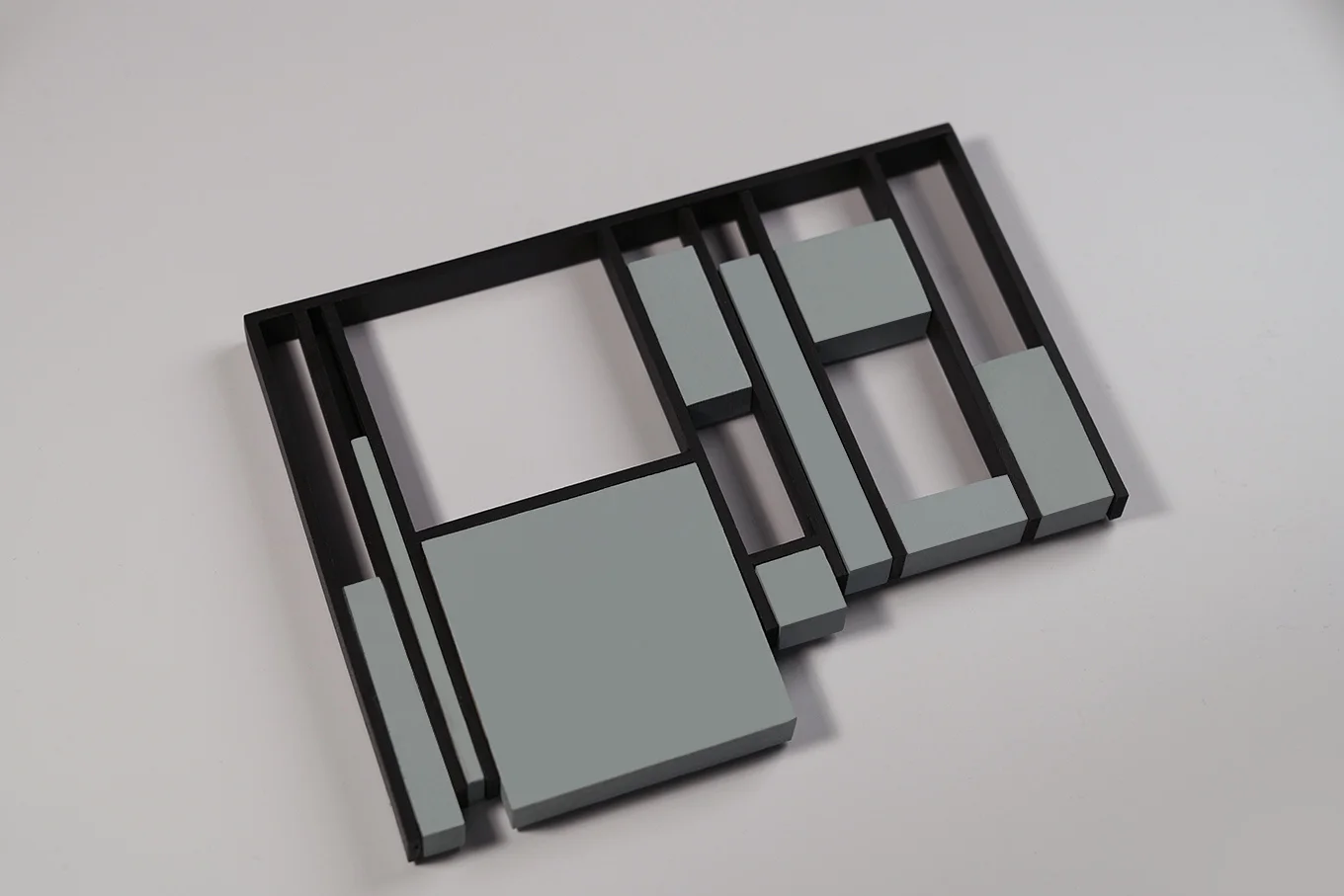 metal frame trivet with stone blocks