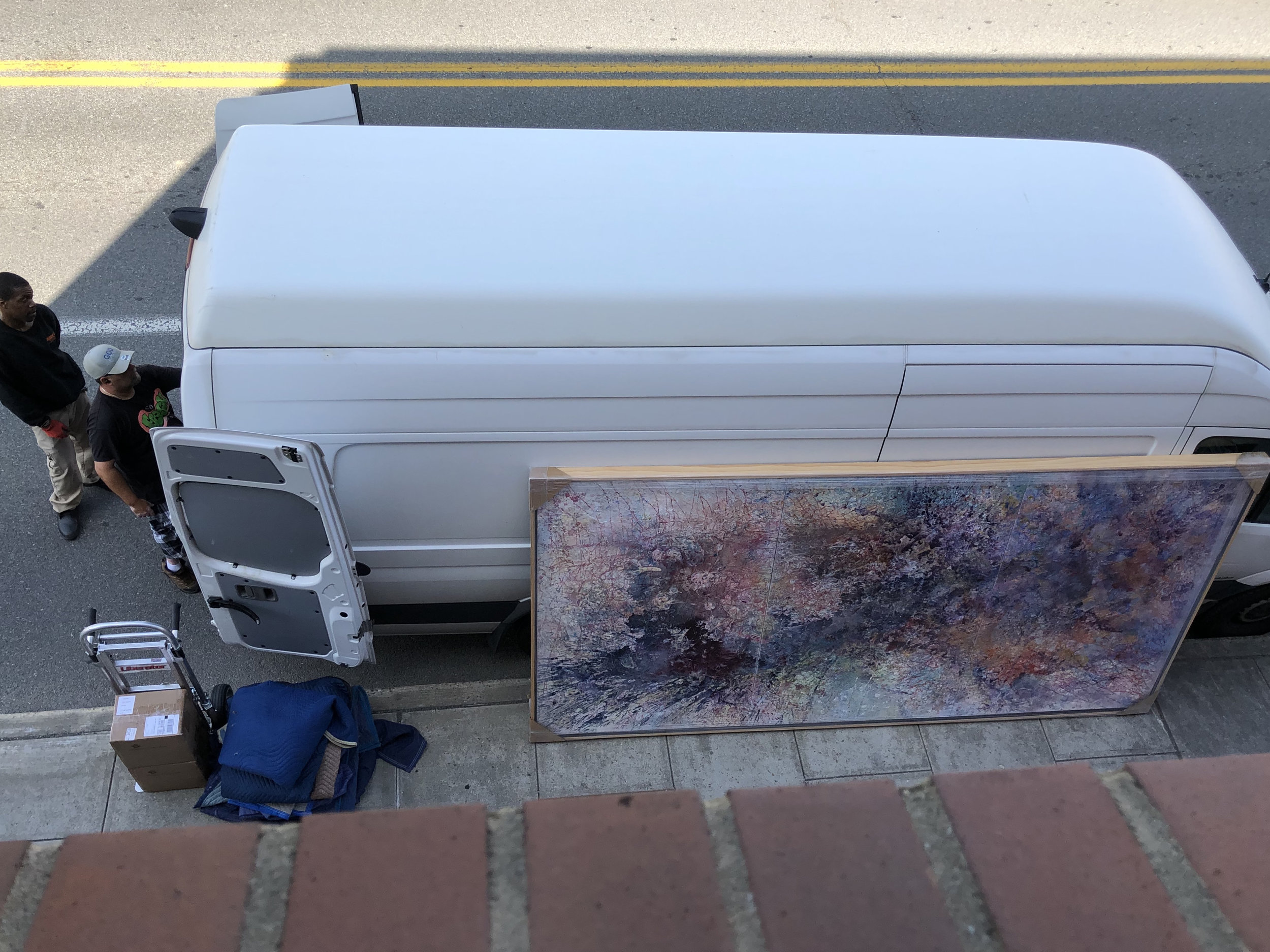 Aurora Borealis 3 waits patiently outside the moving van.