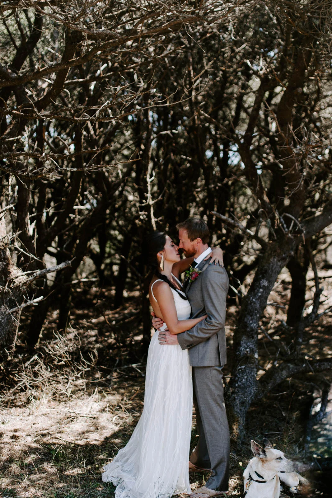 pacific city cape kiwanda community center oregon coast wedding beach feminist queer lgbtq photographer jamie carle lgbt overcast sunny harsh sun reception pink bridesmaids dresses