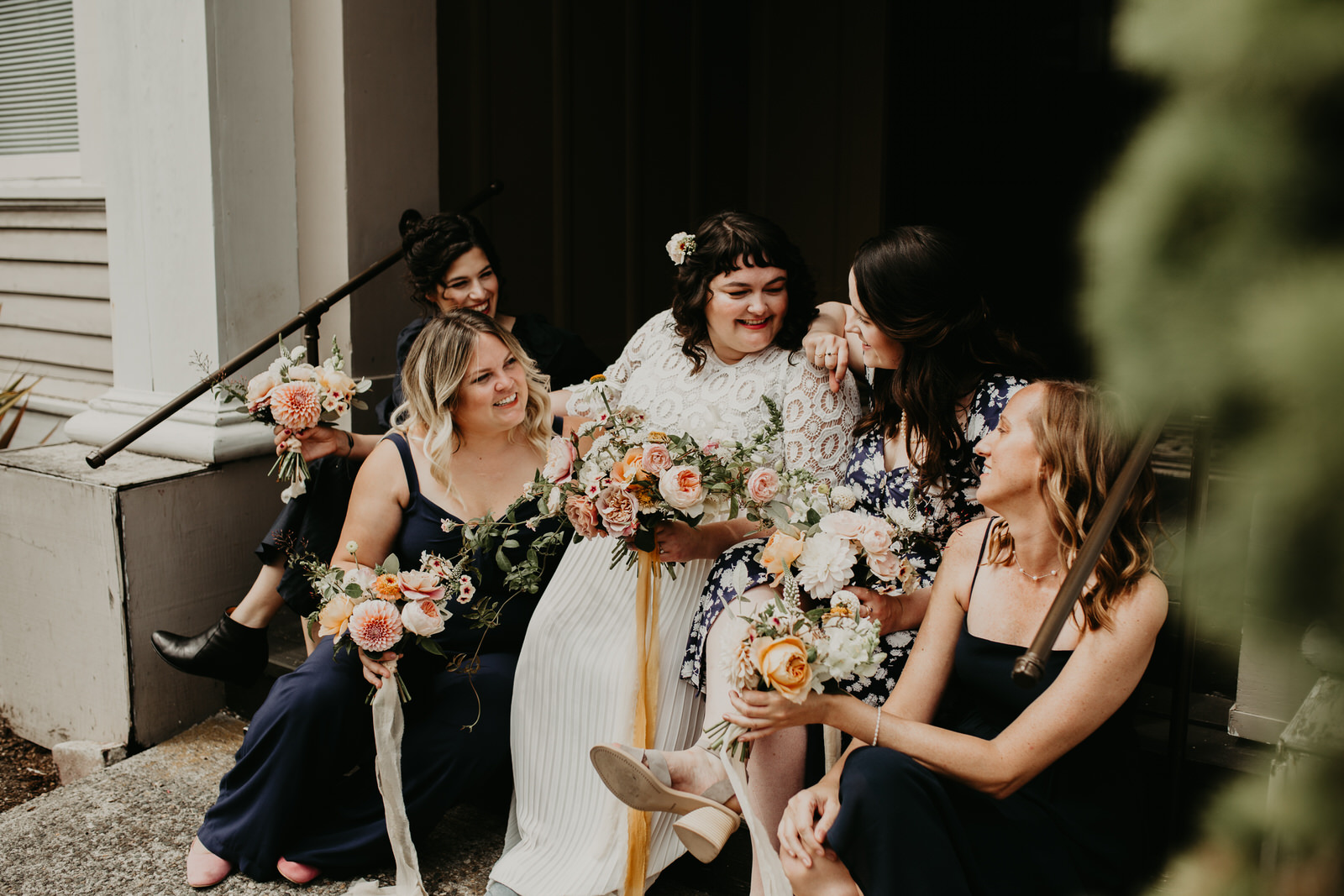 ashley joel astoria oregon the ruins wedding venue florals portland washington coast balloons vintage ceremony reception jamie carle feminist lgbtq lgbt couple photographer photography