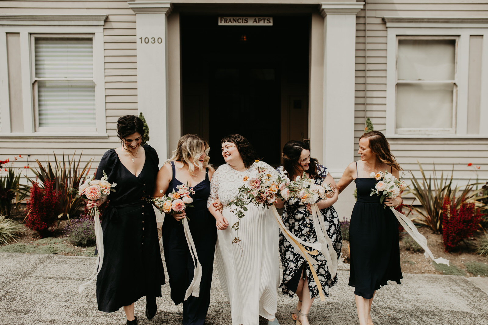ashley joel astoria oregon the ruins wedding venue florals portland washington coast balloons vintage ceremony reception jamie carle feminist lgbtq lgbt couple photographer photography