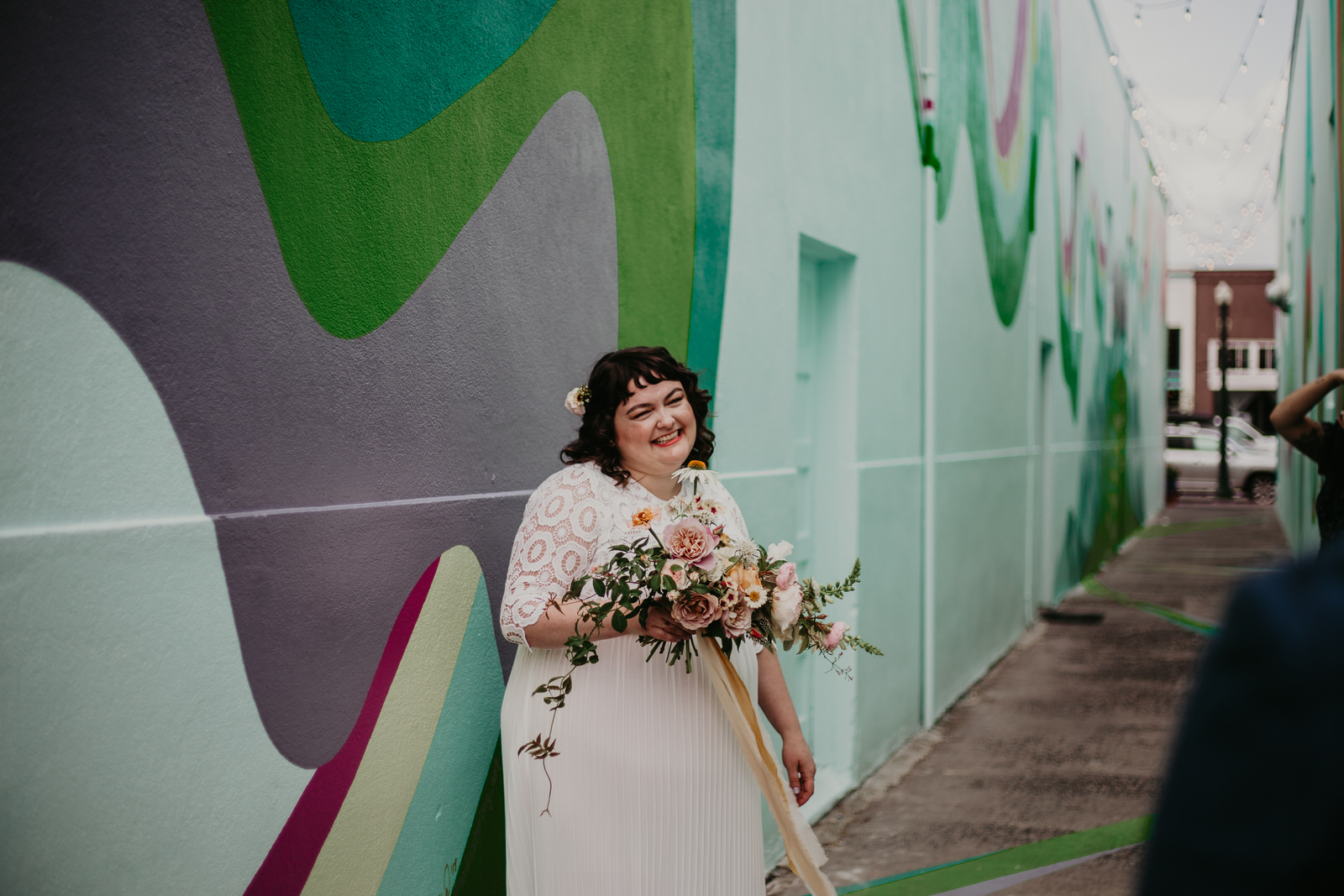 ashley joel astoria oregon the ruins wedding venue florals portland washington coast balloons vintage ceremony reception jamie carle feminist lgbtq lgbt couple photographer photography