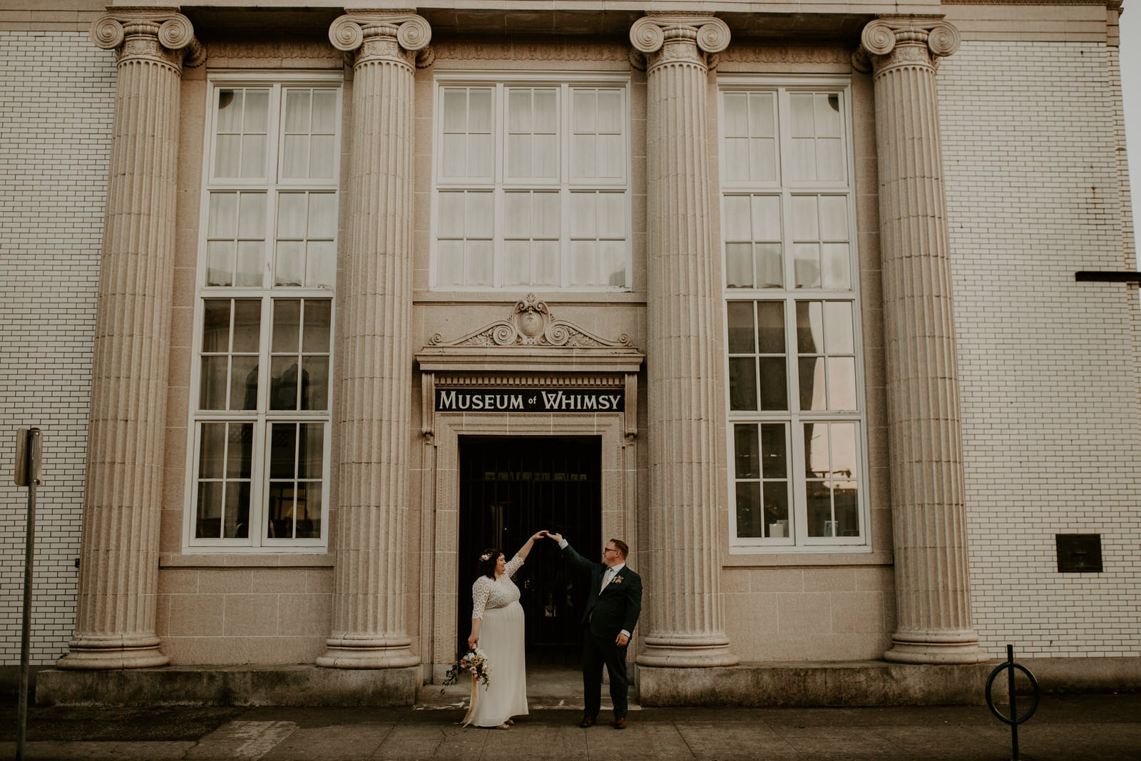 ashley joel astoria oregon the ruins wedding venue florals portland washington coast balloons vintage ceremony reception jamie carle feminist lgbtq lgbt couple photographer photography