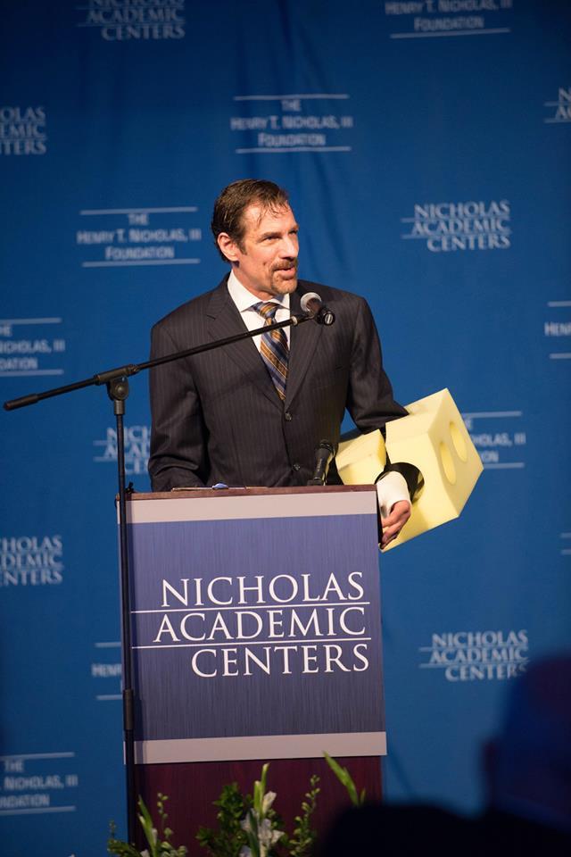 NAC Co-Founder Dr. Henry T. Nicholas, III speaks to the graduation audience