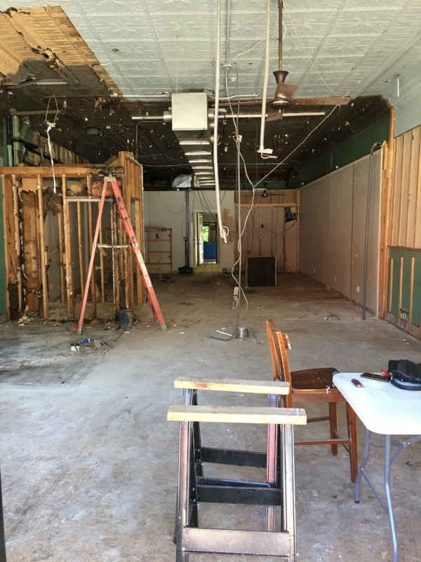 The current reno state of the shop. Its been gutted completely for us to start over creating a beautiful shell and bring back all the old charm this early 1900's building had. Its so amazing to uncover its beauty that had been lost and covered up by years of 'updating'.