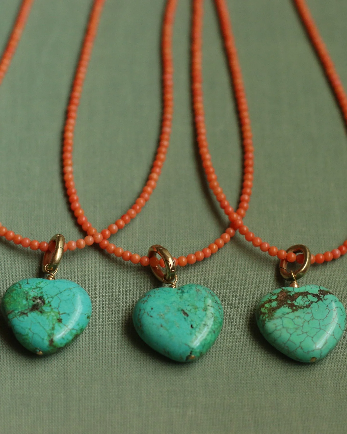 Lover Necklace - Small faceted Orange Coral beads with focal of gorgeous carved Turquoise heart on our charm keeper clasp. So you can add more charms to your heart, take the charm off completely, AND OR add your Turquoise heart to any mother chain or