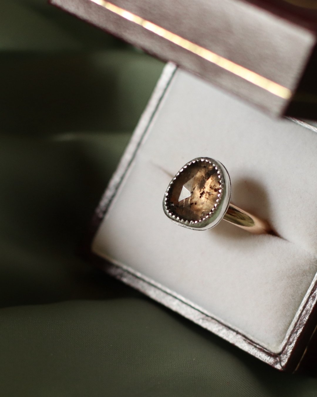 Smoky quartz wrapped in sterling with a simple gold filled band. 
Available August 14 +15th at Depot Hill Creative Makers Market. ✨ 
@depothillcrrative 

 #cirealexandria #jewelry #handmadeisbetter #jewelrybox #jewelrylover #jewelrystyle #imadeyourje