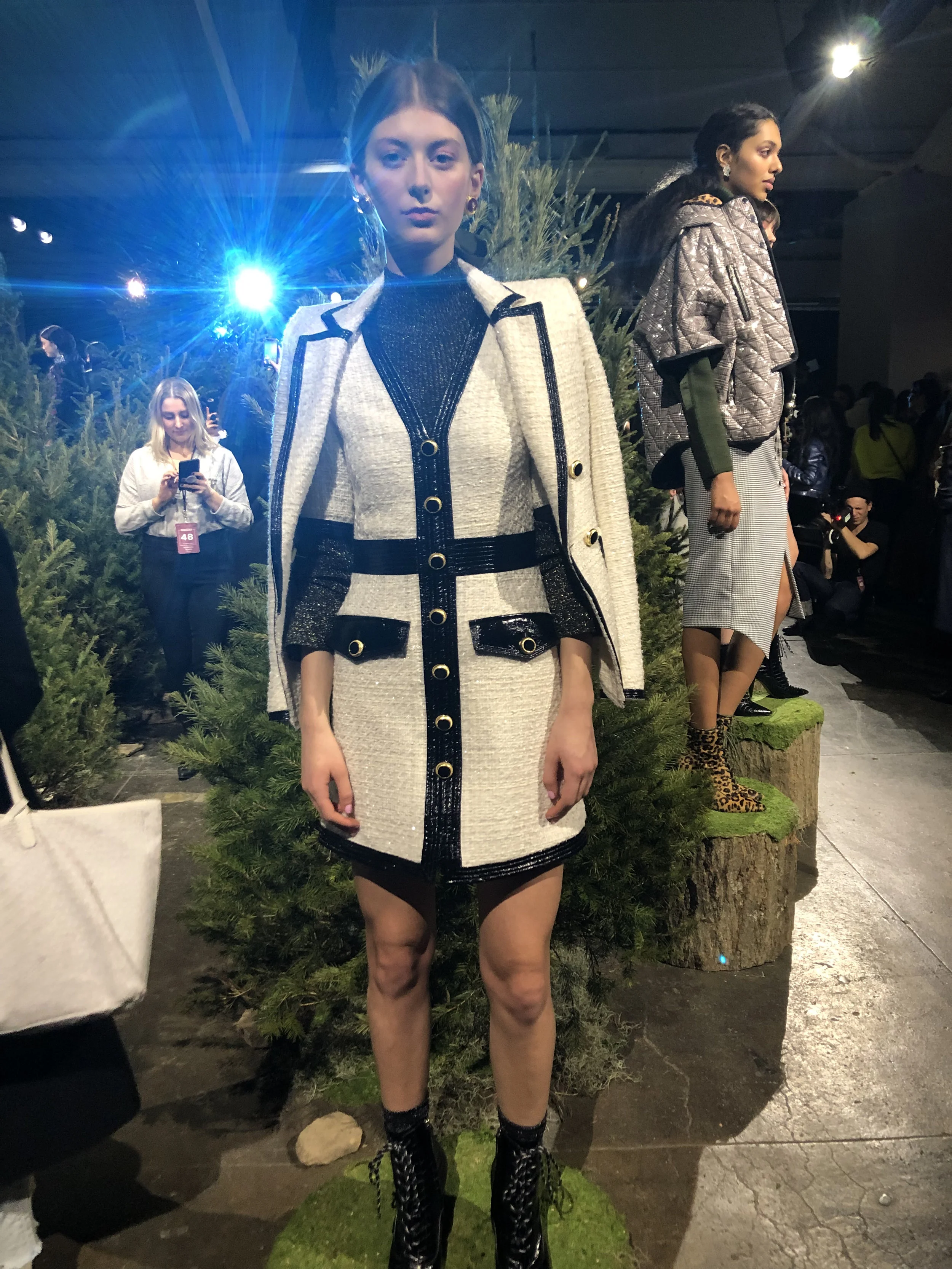 Model is wearing: Black LILA Turtleneck, Ivory SIMONA Dress, Ivory VERONA Jacket, Black PAULA Boots