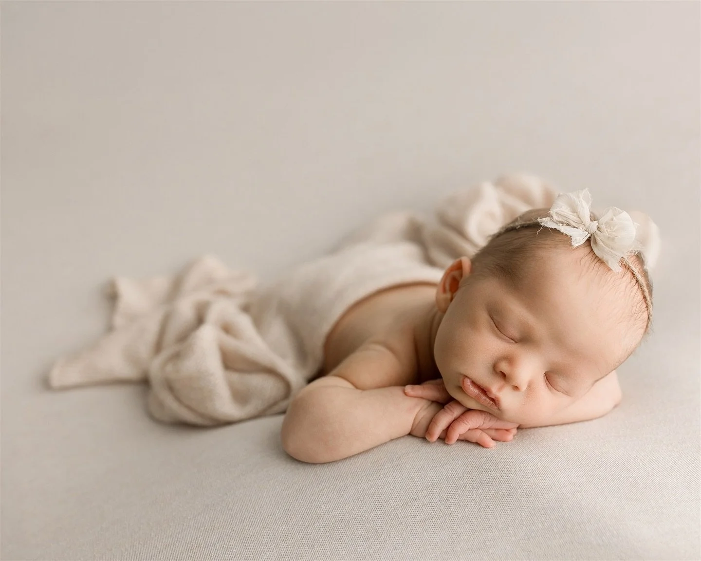 I am loving the simplicity of neutral newborn sessions. I think it helps to keep all of the attention on the sweet faces in the photographs. This little girl is so beautiful and has a stunning mommy too!