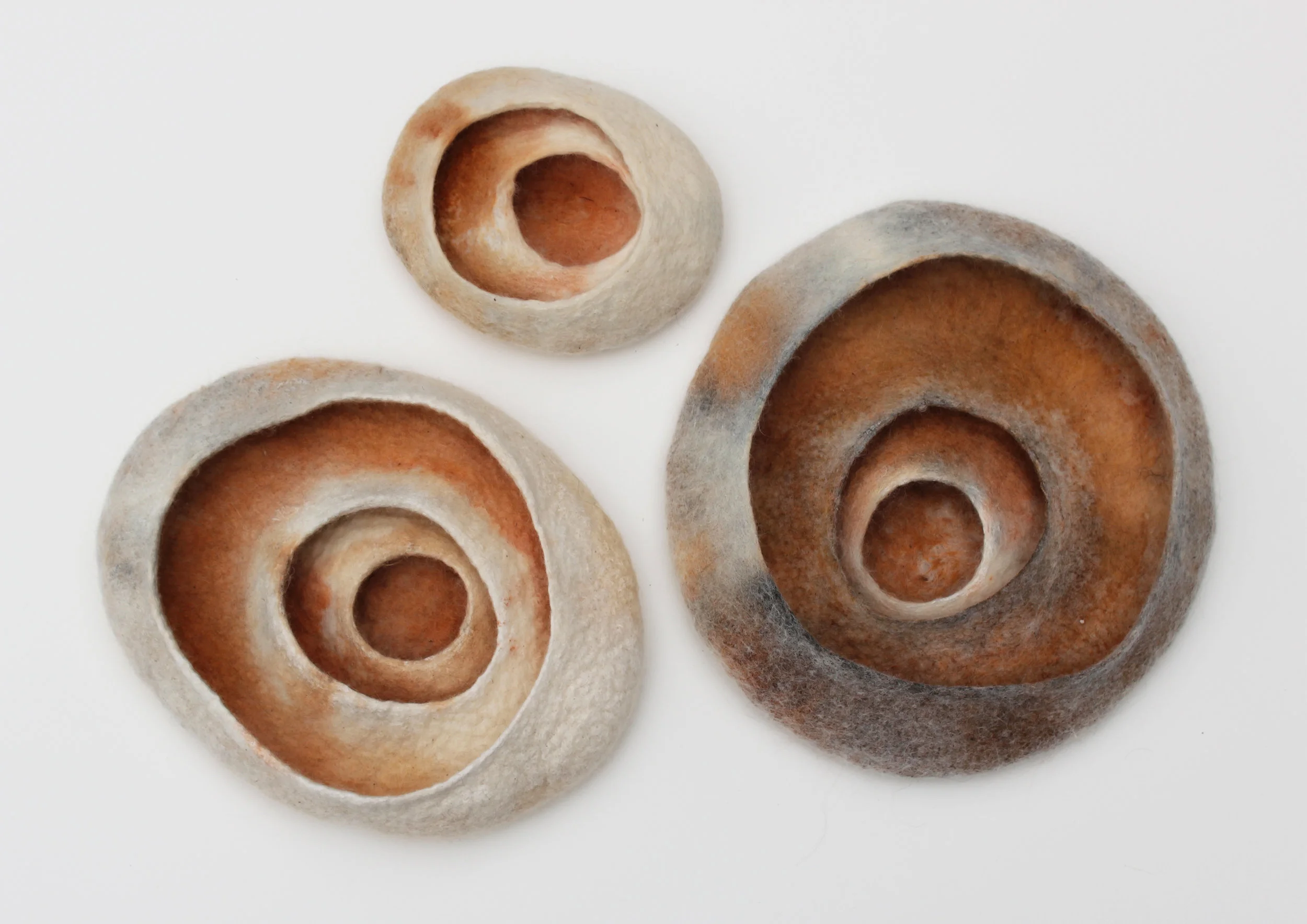 Topographic Organs - Merino + Corriedale Wool, Earth pigment. Left exposed to weather for 2 weeks.