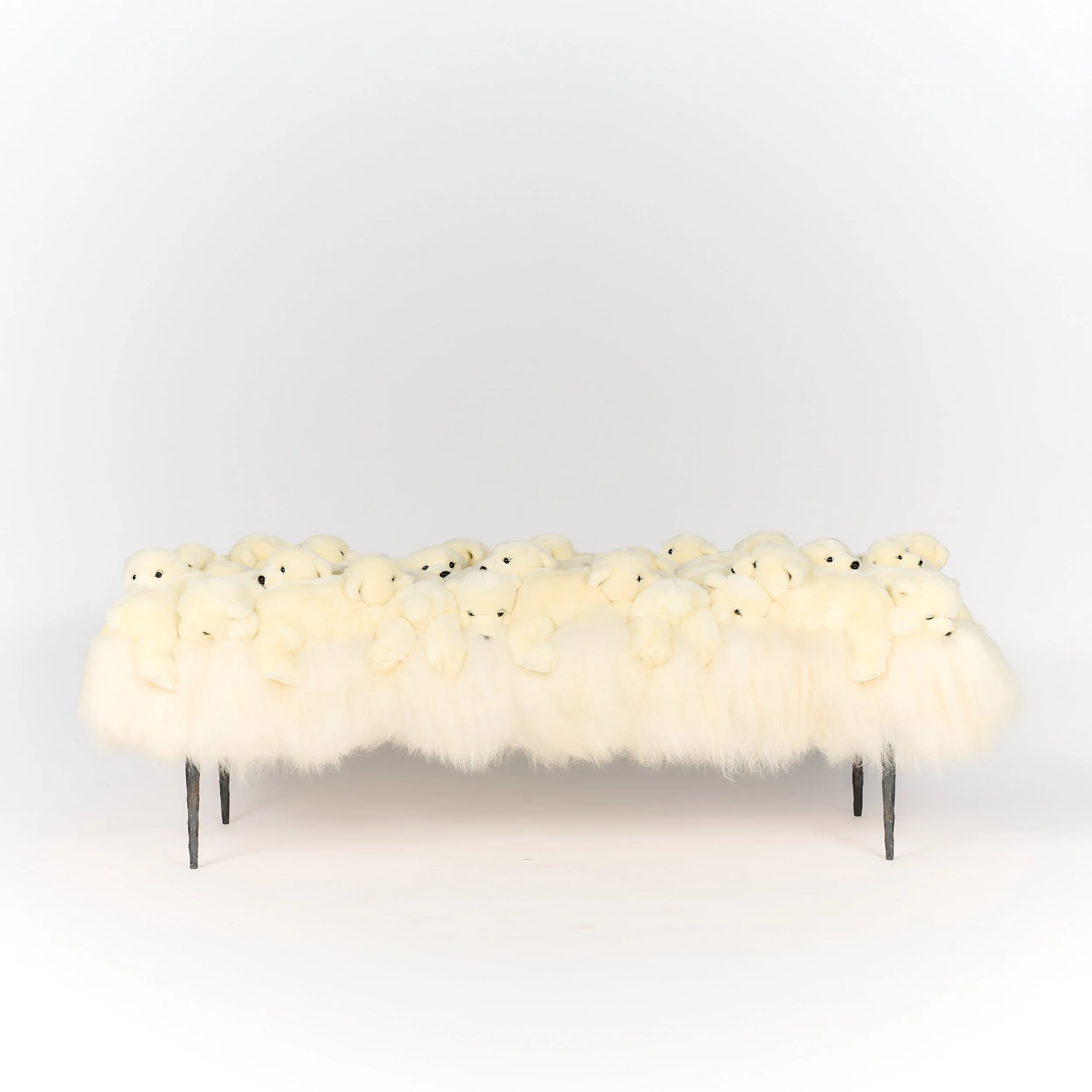 POLAR  BENCH

Limited Edition of 50 + 3 AP  

Animal charity donation 

Handmade in Belgium, AP design bench, Black hammered metal finish, white Icelandic sheepskin, polyester fabrics Polar bears, 160x60x50 cm.