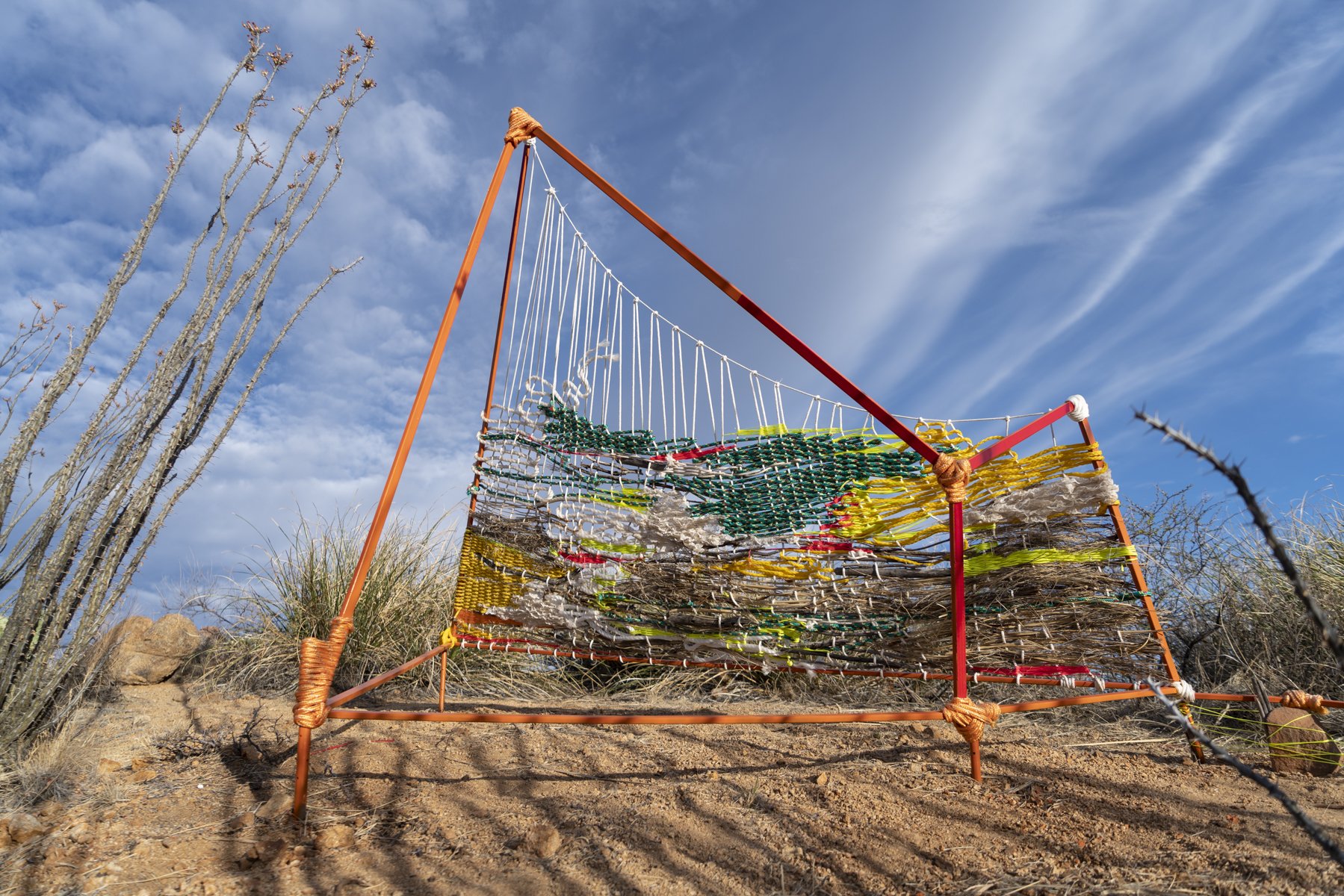  Making- Do, completed sculpture, Steel, spray paint, rope, found fibers, found natural material, and reflective tape.  May 2021. Photograph by Anna Brody 