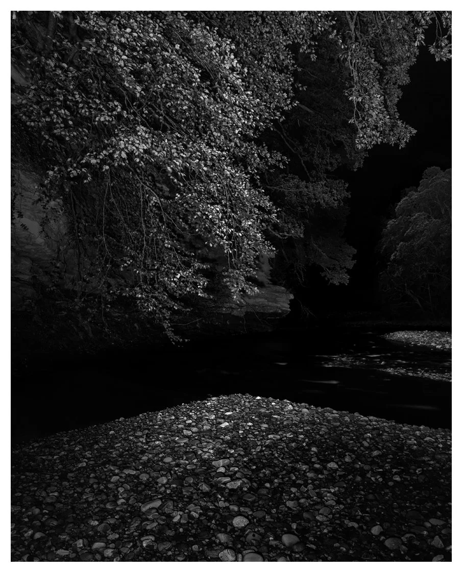  BY THE DARK RIVER