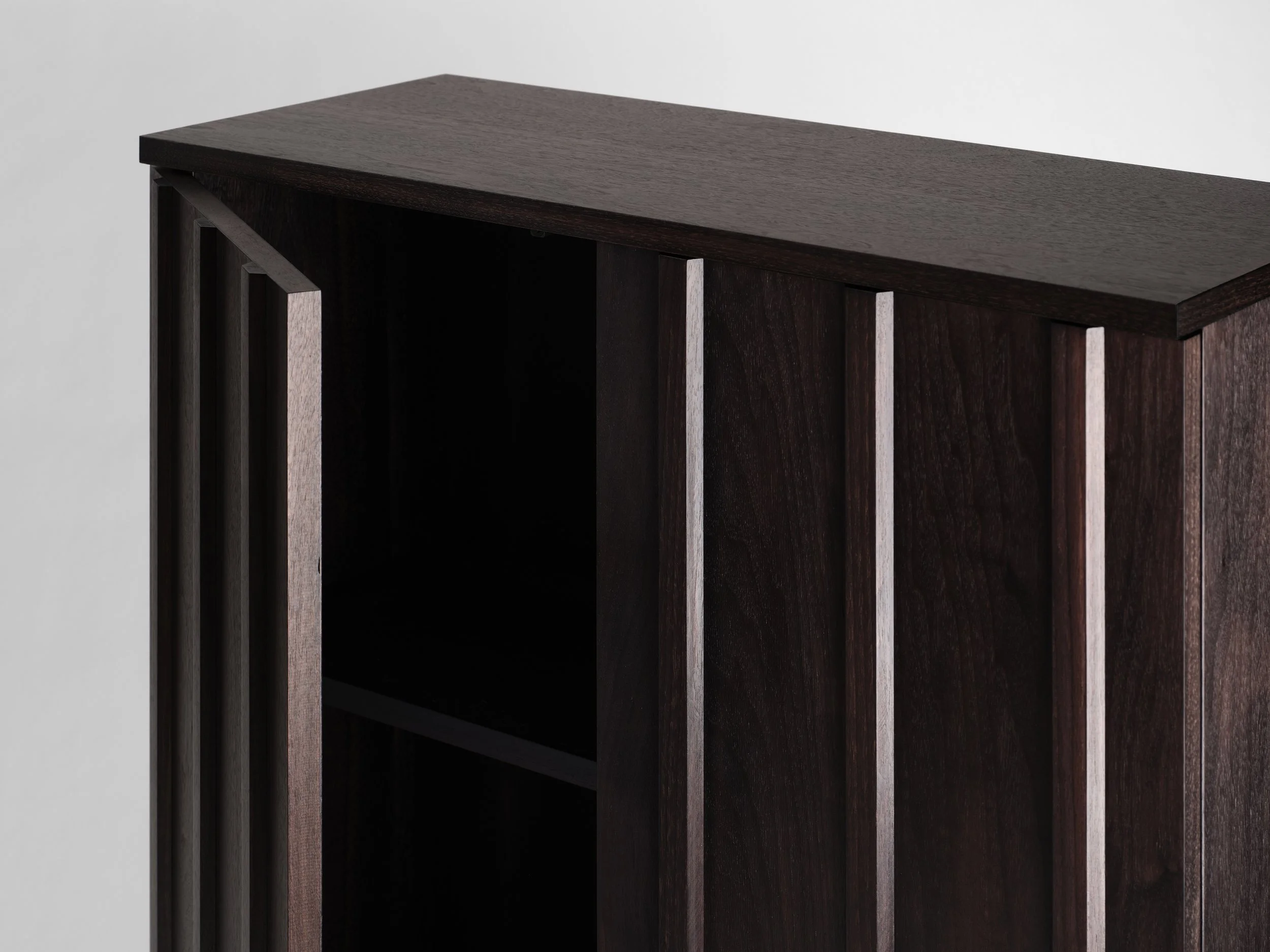 Close-up shot of modern sideboard cabinet with shelf