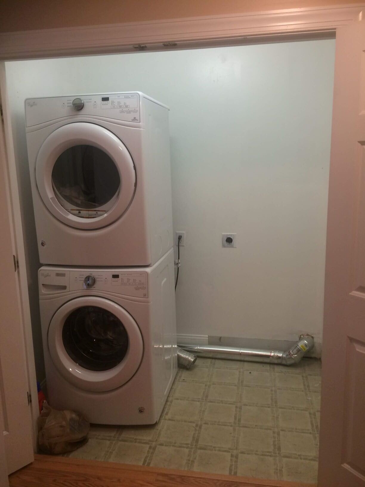  This laundry closet was ready for more storage capacity after the homeowner converted to a stackable washer and dryer. 