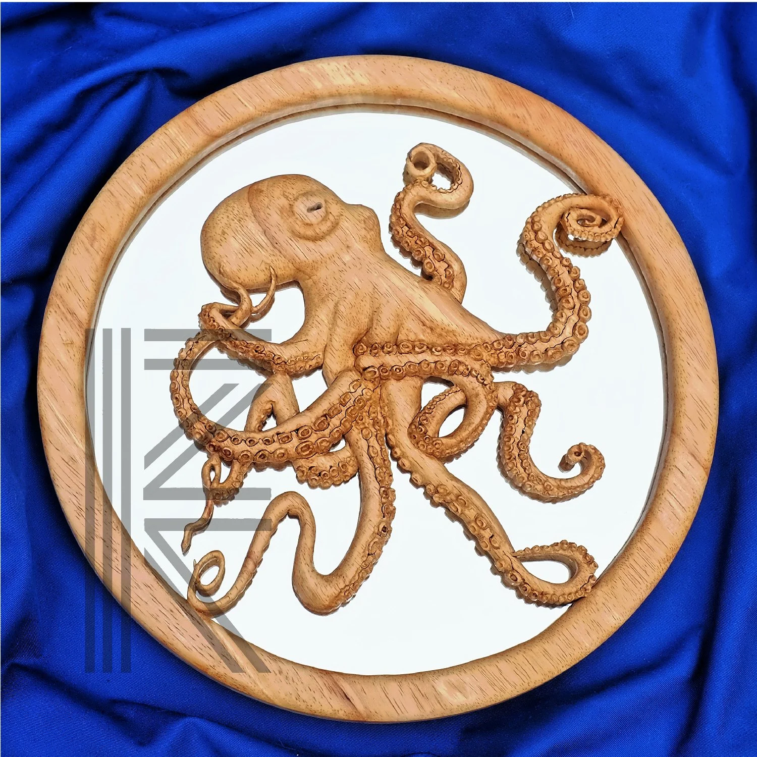 Hand carved octopus  - mirror ©Fiona Kingdon
