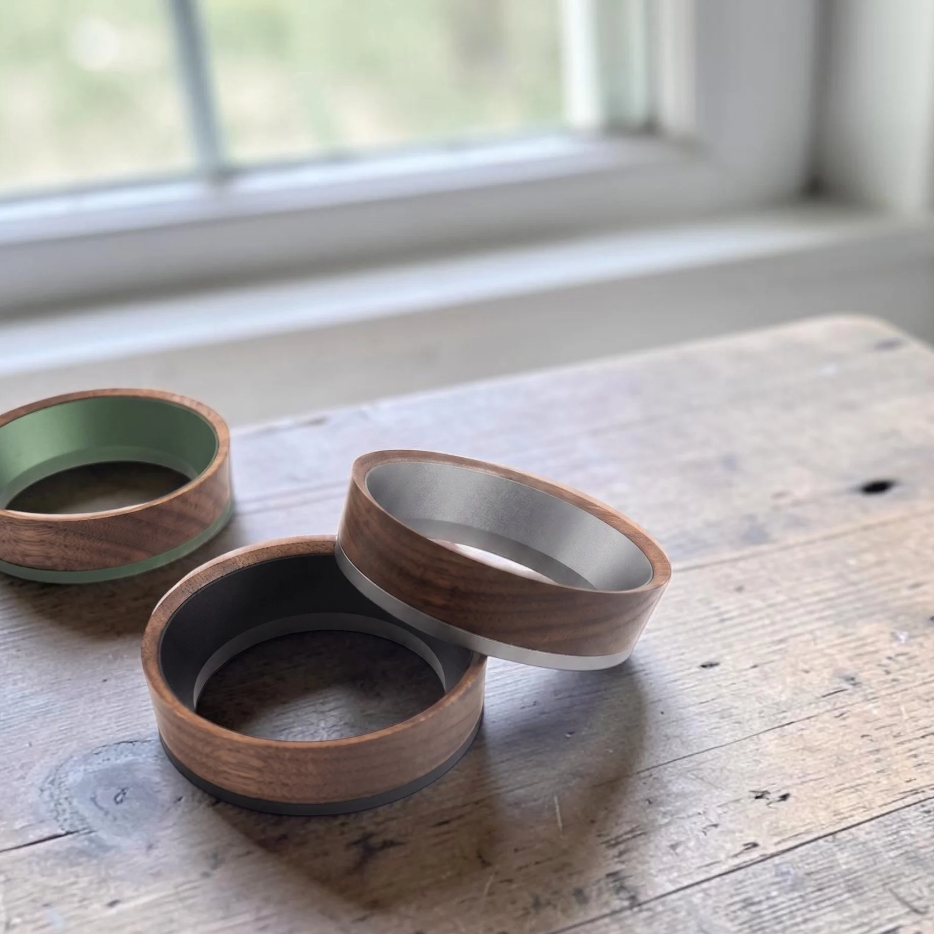 Airflow dosing rings on wood.jpeg