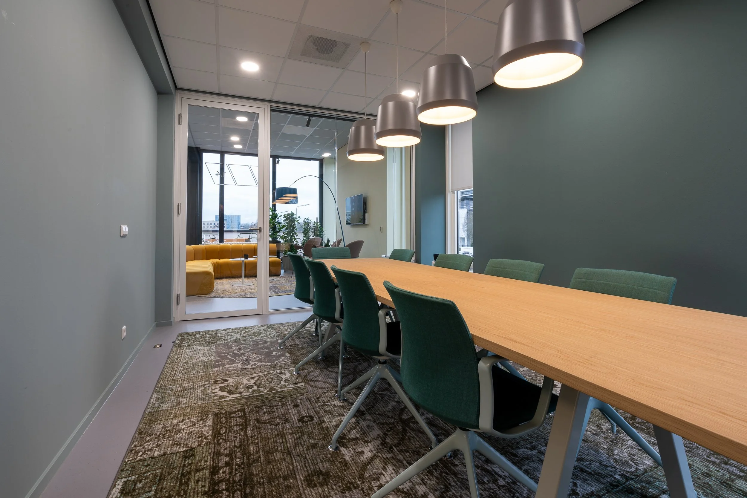 chairs-put-table-room-with-patterned-carpet.jpg