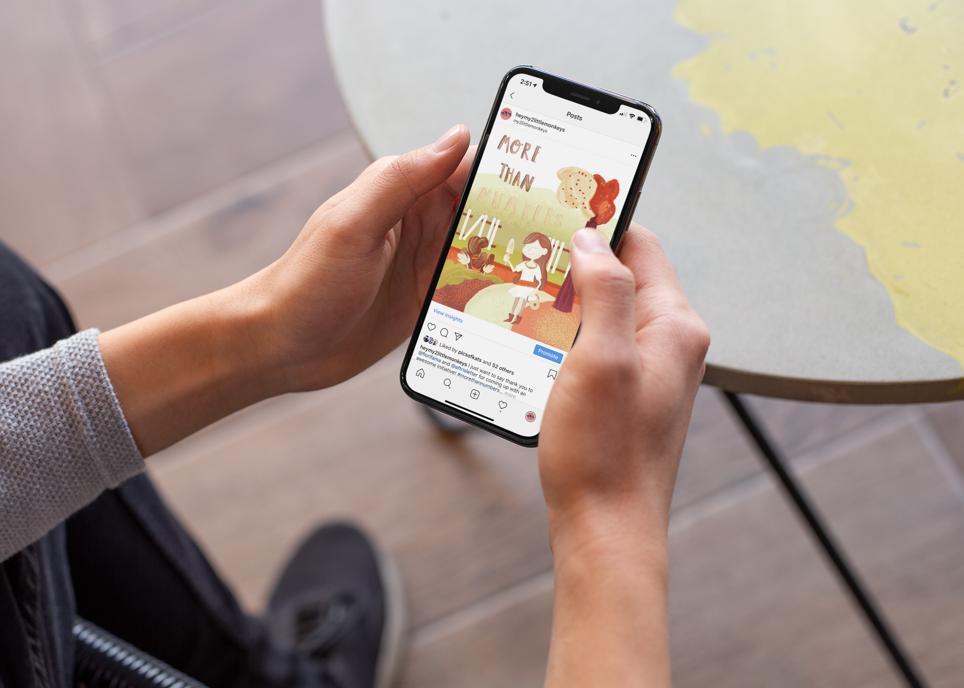 mockup-of-an-iphone-xs-held-by-a-man-outside-25532.png
