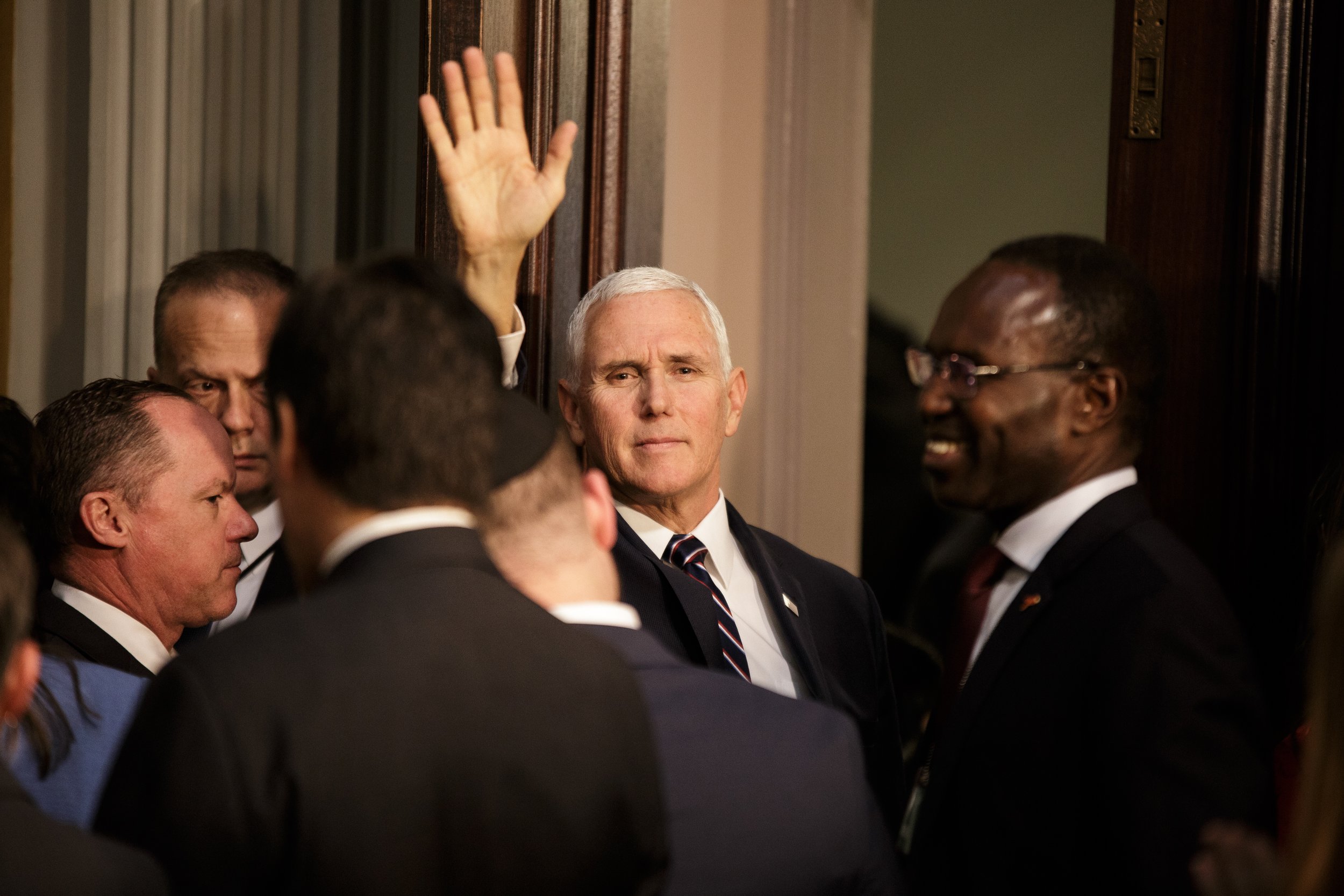  Vice President Mike Pence glances at the press after giving an address on World Aids Day in the Eisenhower Executive Office Building.      November 2018   