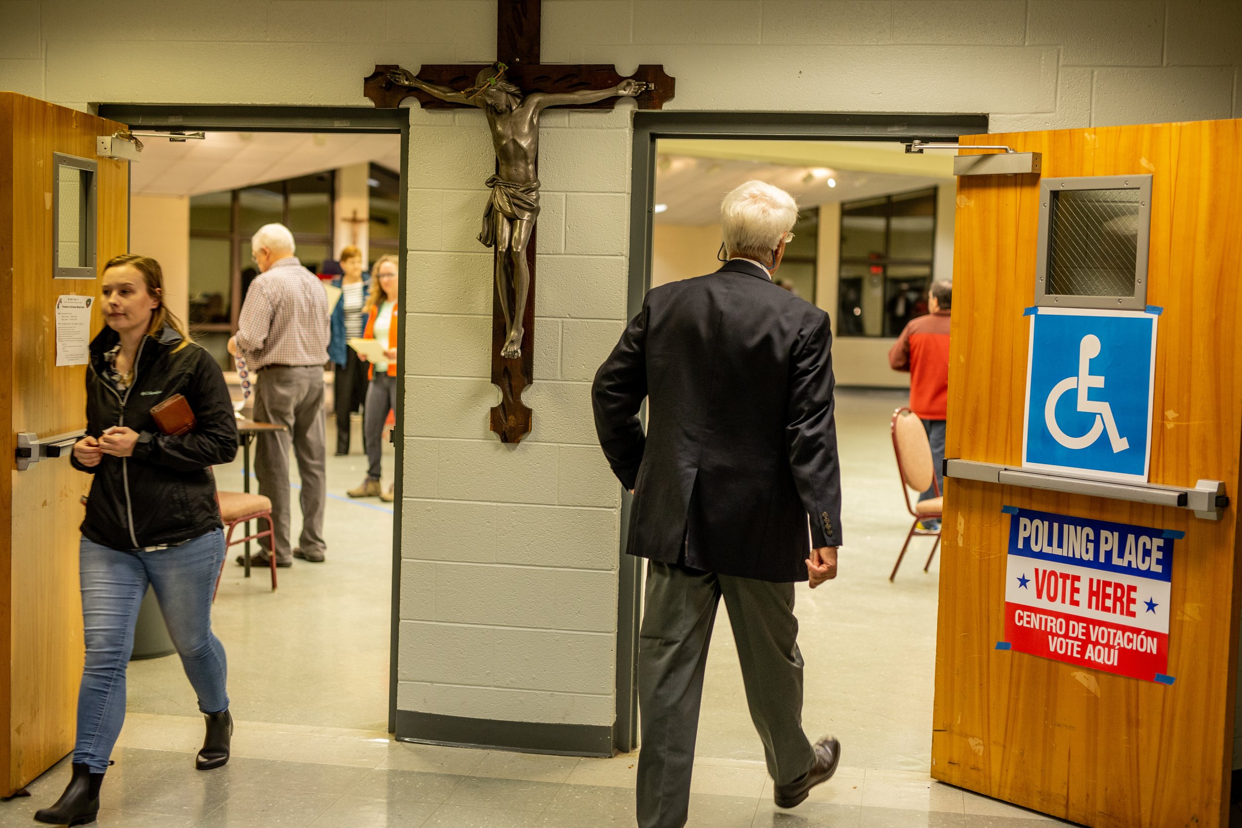  People enter a church turned into a polling place during the 2018 midterm elections.    November 2018   