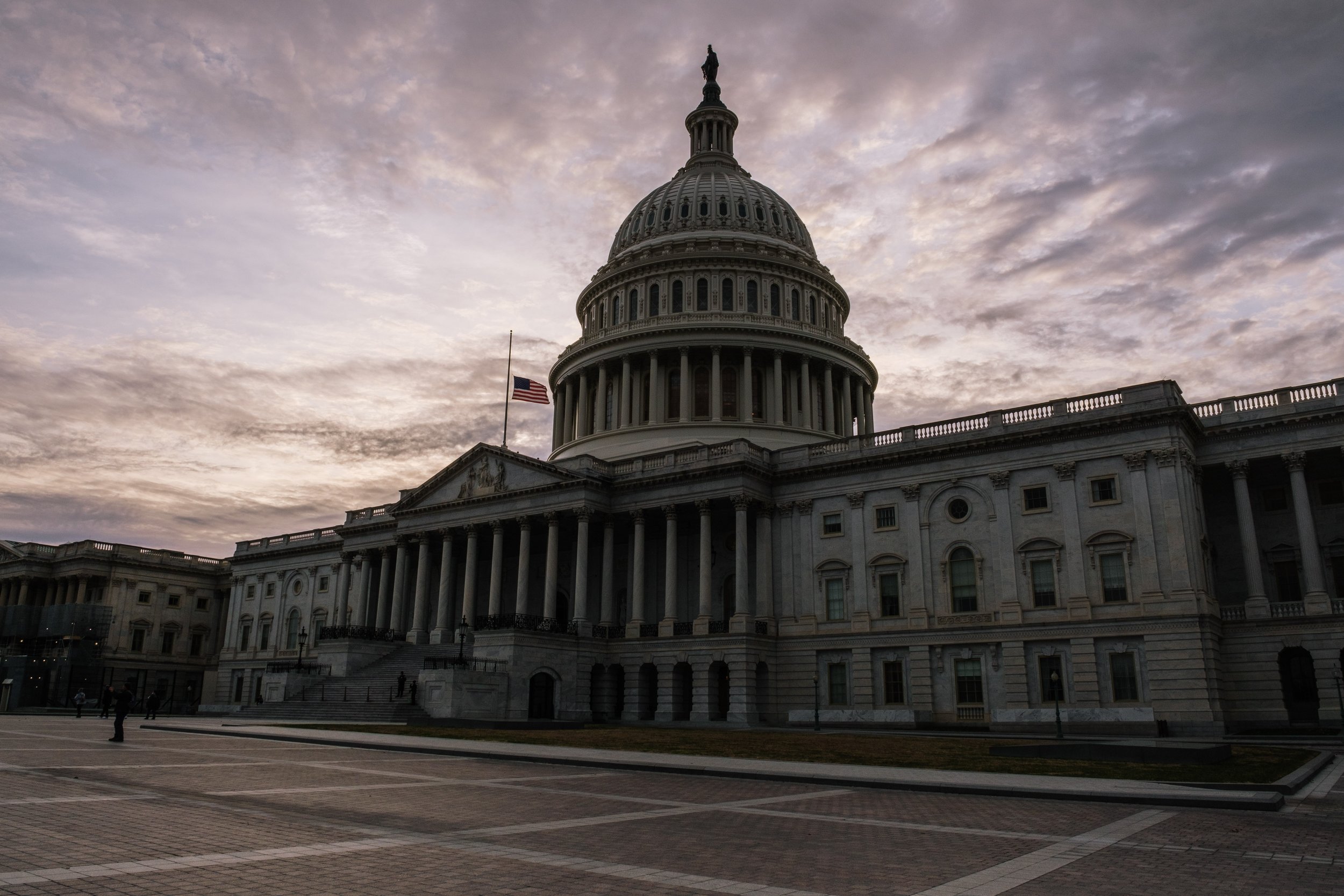  The Capitol seen at sunset.  The flag remains at half staff following the death of President George H.W. Bush.    December 2018   