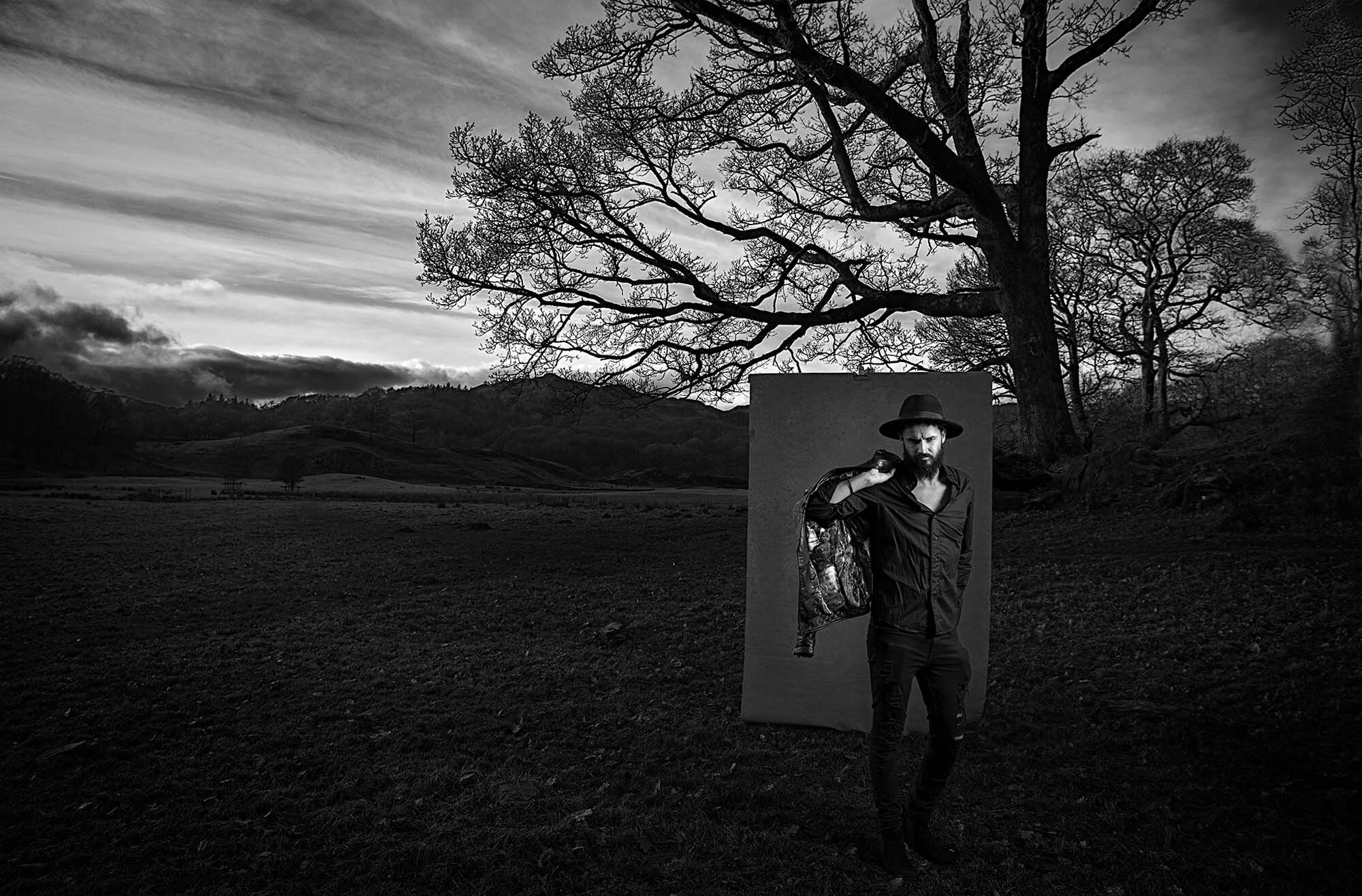 Black_&_white_image_outside_with_model_and_backdrop_.jpg