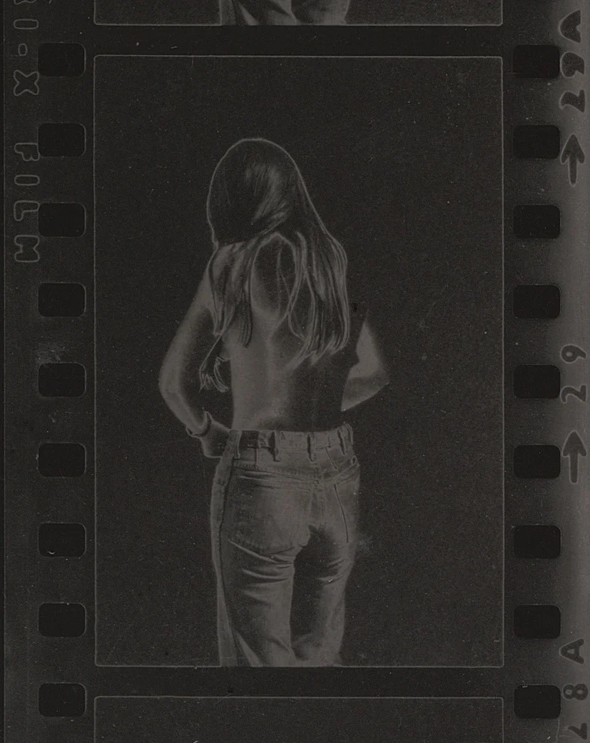 Sherie Undressing (Tri-x), solarized silver gelatin print